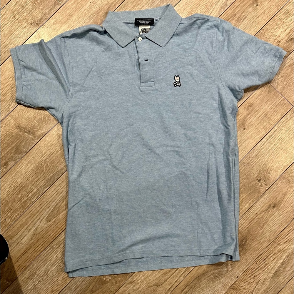 Psycho Bunny light blue polo shirt, size 7 (equivalent of XL)